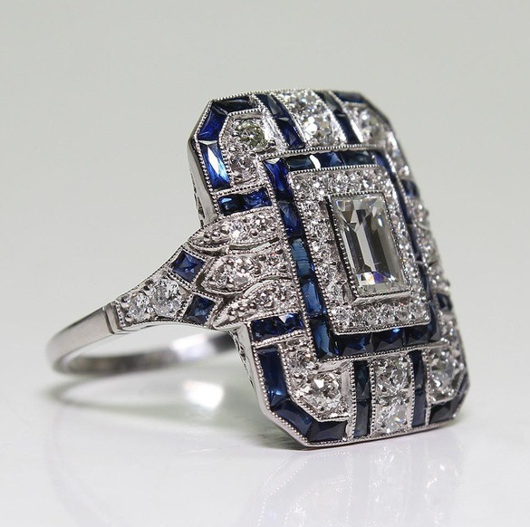 Antique Polished Silver Ring Featuring Blue Zircon