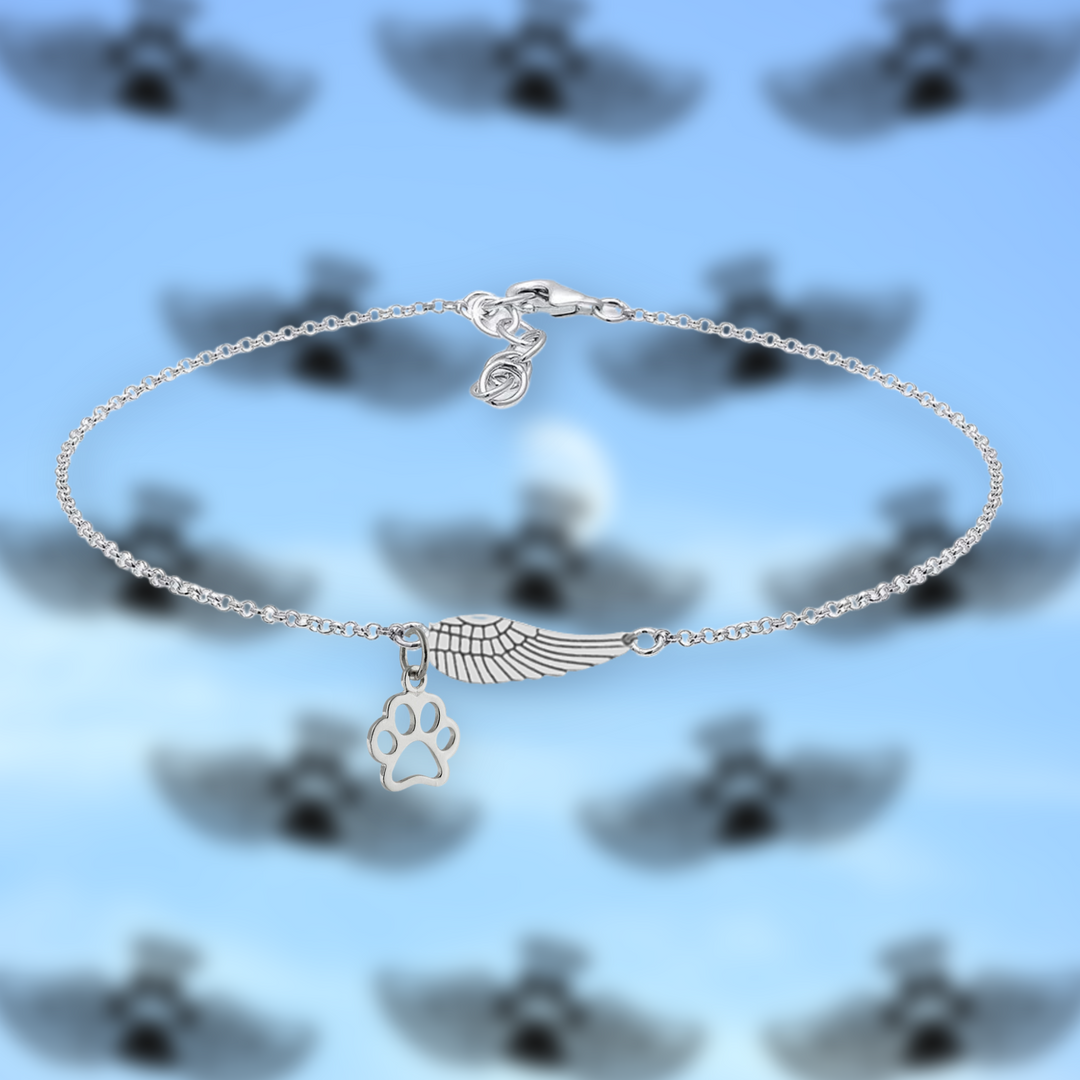 Marike Memorial Silver Bracelet Featuring Angel Wing and Paw Print